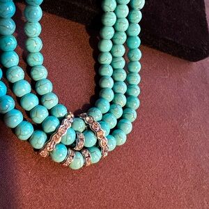 NWT—3-string turquoise bead with silver and rhinestone accents.